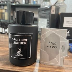 MAISON ALHAMBRA OPULENCE LEATHER BOTTLE JUST 2-3 ML USED ( FREE OFFICIALS VIAL )